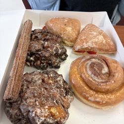 J's Donuts - Apple turn over, Apple fritters, churro and cinnamon roll!
