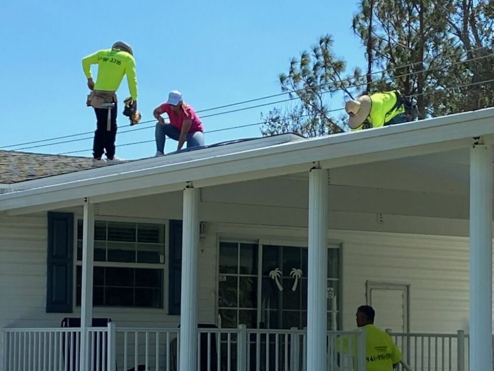 Slide of Rain Proof Roofing & Contracting