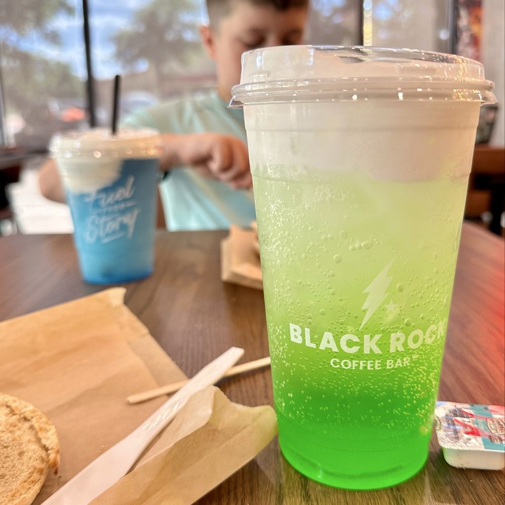 Black Rock Coffee Bar - Iced Witch's Brew Fuel Frozen Blue Lagoon Fuel Rosemary Sea Salt Bagel Plain Bagel - Coffee & Tea Near Me - Austin, Texas Black Rock Coffee Bar - Iced Witch's Brew Fuel Frozen Blue Lagoon Fuel Rosemary Sea Salt Bagel Plain Bagel - Coffee & Tea Near Me - Austin, Texas