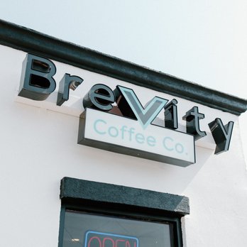 Brevity Coffee - a sign on the side of a building - Coffee & Tea Near Me - San Antonio, Texas Brevity Coffee - a sign on the side of a building - Coffee & Tea Near Me - San Antonio, Texas