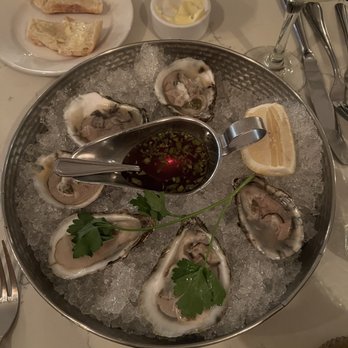 Petit Robert Bistro - Half Dozen Local Oysters with mignonette sauce - French Near Me - Boston, Massachusetts Petit Robert Bistro - Half Dozen Local Oysters with mignonette sauce - French Near Me - Boston, Massachusetts