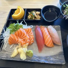Sashimi and Nigiri on lunch bento,  thick slices, fresh and buttery