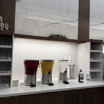 Delta Sky Club - Terminal C - Water and juice, espresso machines not shown - Airport Lounges Near Me - Queens, New York