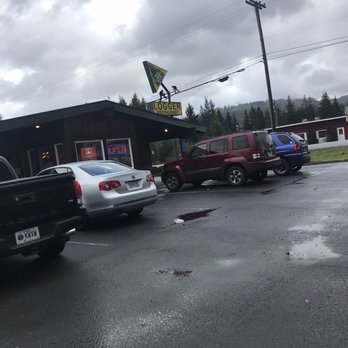 High Climber Room & the Logger - cars parked in a parking lot - Lounges Near Me - Astoria, Oregon High Climber Room & the Logger - cars parked in a parking lot - Lounges Near Me - Astoria, Oregon