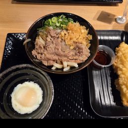 Nikutama with egg on the side and squid tempura Nikutama with egg on the side and squid tempura