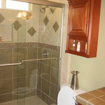 Sommer Construction - a bathroom with a toilet and shower - General Contractors Near Me - Solana Beach, California