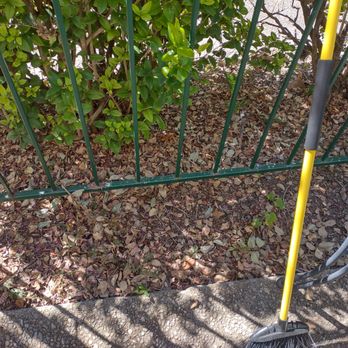 Greener Grass Lawn Company - a broom leaning against a fence - Landscaping Near Me - Live Oak, Texas Greener Grass Lawn Company - a broom leaning against a fence - Landscaping Near Me - Live Oak, Texas