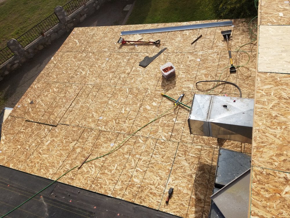 Slide of Rhino Roofing & Construction