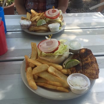 The Hideout Restaurant - Two Blackened Fish Sandwiches! The hideout is amazing! My new favorite fish spot in Key Largo! - American Near Me - Key Largo, Florida The Hideout Restaurant - Two Blackened Fish Sandwiches! The hideout is amazing! My new favorite fish spot in Key Largo! - American Near Me - Key Largo, Florida