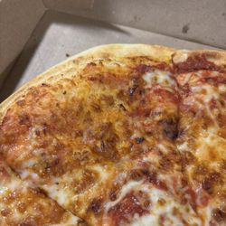 Little Caesars - The whole cheese pizza barely had any cheese on it just dough and sauce