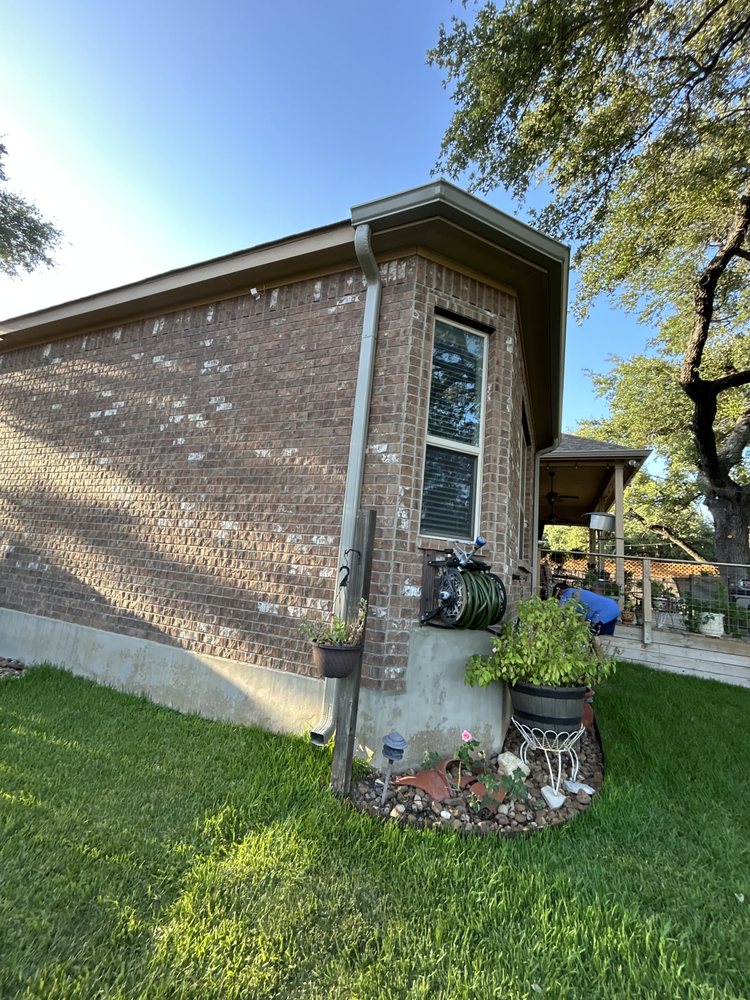 Slide of Gonzalez Seamless Rain Gutters