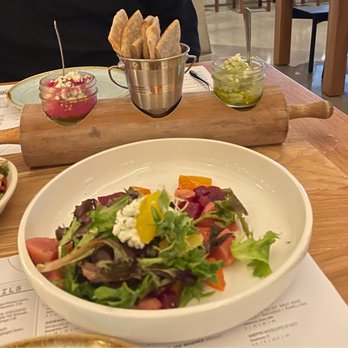 Sixty Vines - Beet salad and hummus in the background. - New American Near Me - Boca Raton, Florida Sixty Vines - Beet salad and hummus in the background. - New American Near Me - Boca Raton, Florida