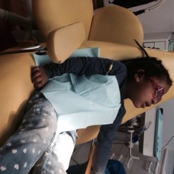 Dentists4kids - Waiting with her cool shades!! I don't know why the pic is sideways!