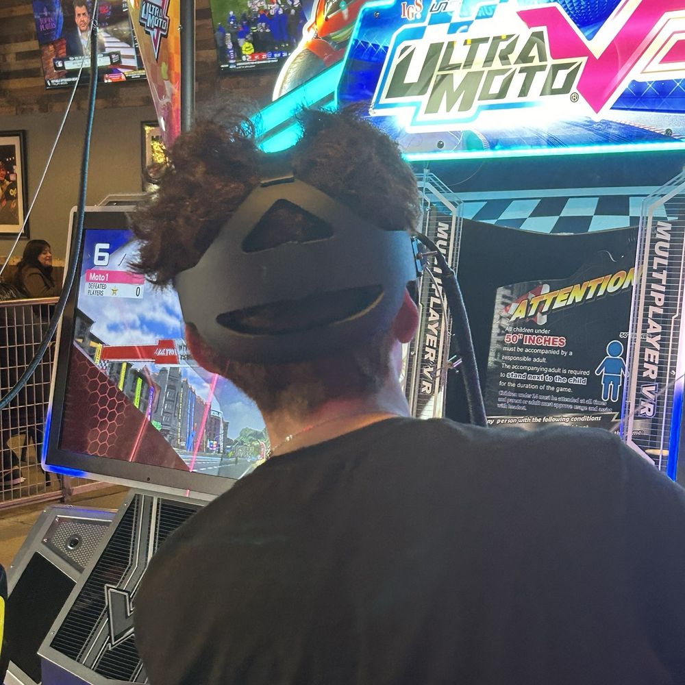 MB2 Entertainment - My son playing vr game with his floofy hair - Venues & Event Spaces Near Me - Bakersfield, California