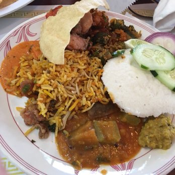 Signature India - Not a big fan of idli but you can try the vegetarian curries. - Indian Near Me - Bloomington, Illinois