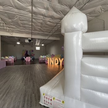 Ear Hustlaz Studios - Setup for a baby turning 1 years old! 8-10 tables, bounce house, and plenty of food and gifts! - Venues & Event Spaces Near Me - Dallas, Texas