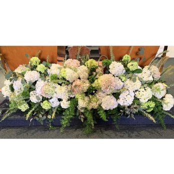 Hudson Florist - Podium flowers. An assortment of hydrangea and greens. Can be used for wedding or sympathy service. - Florists Near Me - Jersey City, New Jersey Hudson Florist - Podium flowers. An assortment of hydrangea and greens. Can be used for wedding or sympathy service. - Florists Near Me - Jersey City, New Jersey