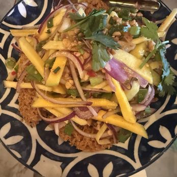 Saranrom Thai - Yum Pla Duk Fu salad( Fried Fish with Mango Salad) - Thai Near Me - Elmhurst, New York Saranrom Thai - Yum Pla Duk Fu salad( Fried Fish with Mango Salad) - Thai Near Me - Elmhurst, New York