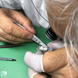 Löwen Watch Group - Using Teflon tweezers when replacing hands. This eliminates scratches on the hands.