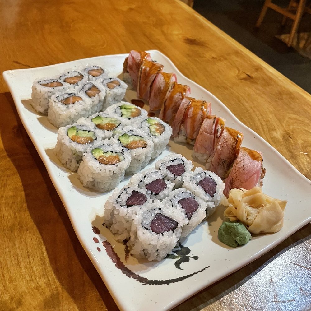 (1) Valentine Roll, (2) Boston Roll, (3) Salmon Avocado Roll, and (4) Tuna Roll.