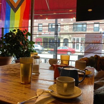 Kopi A Travelers Cafe - a person sleeping on a couch - Coffee & Tea Near Me - Chicago, Illinois Kopi A Travelers Cafe - a person sleeping on a couch - Coffee & Tea Near Me - Chicago, Illinois