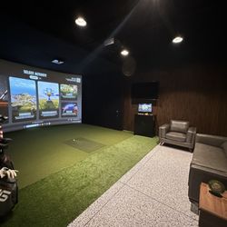 GooD LiFe Golf Lab - Bay 1 complete with Trackman iO, 3 camera angles. comfortable leather seating.