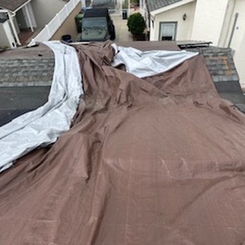Powur Solar - They installed this tarp and left it for almost a year after they couldn't find another repairer to come back. - Solar Installation Near Me