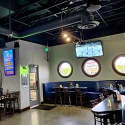 Flowing Tide Pub 12 - Nautical themed sports bar. Clean and crisp.