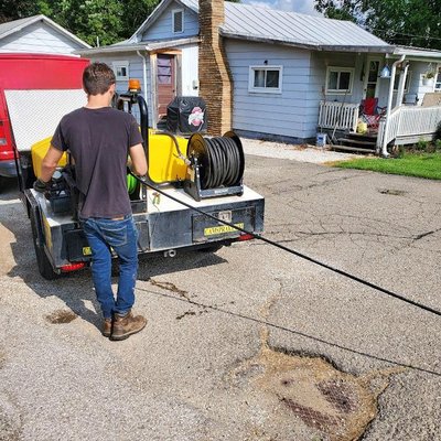 Brown Drain Service Logo