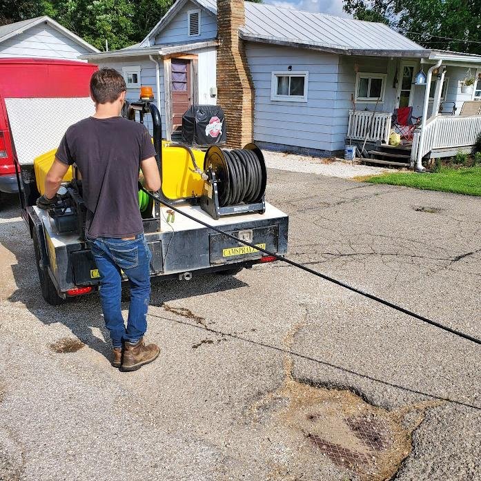 Slide of Brown Drain Service