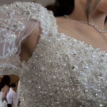 Mayana Bridals - Before I even left my hotel room. One tiny thread holding these sleeves to the dress. - Bridal Near Me - Glendale, California Mayana Bridals - Before I even left my hotel room. One tiny thread holding these sleeves to the dress. - Bridal Near Me - Glendale, California