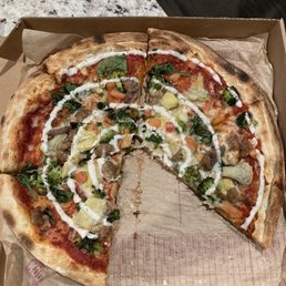 Pizza with red sauce, spinach, artichoke, broccoli, sausage, anchovies, ranch (~$11)