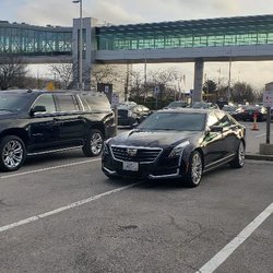 Autonomous Chauffeur - Our Large SUV & Luxury Sedan picking up clients at T.F.Green Airport.