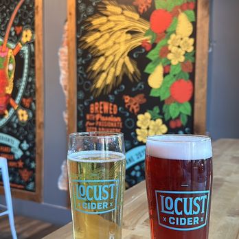 Locust Cider - Spokane - two beers on a table - Cideries Near Me - Spokane, Washington