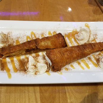 Poutineville - Xango: Deep fried cheesecake, powdered with cinnamon, drizzled with caramel, with whipped cream - Poutineries Near Me - Montreal, Quebec Poutineville - Xango: Deep fried cheesecake, powdered with cinnamon, drizzled with caramel, with whipped cream - Poutineries Near Me - Montreal, Quebec
