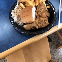 a plate of fried chicken and french fries a plate of fried chicken and french fries