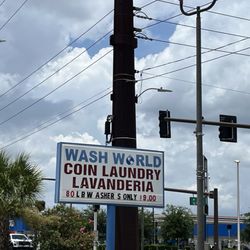 Wash World Best Coin Laundromats - Sign