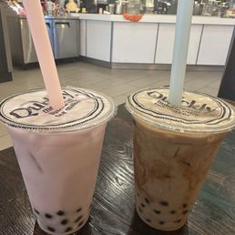 Taro and brown sugar milk teas with boba Taro and brown sugar milk teas with boba