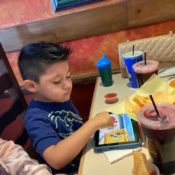 Las Fuentes - My son enjoying his chips and salsa - Mexican Near Me - Reseda, California Las Fuentes - My son enjoying his chips and salsa - Mexican Near Me - Reseda, California