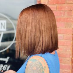 Salon Surreal - Natural color tone with an edgy straight Bob hair cut was on the menu for this beautiful lady.