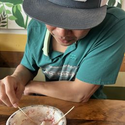 My husband eating the last of my coco strawberry ice cream shaved ice! My husband eating the last of my coco strawberry ice cream shaved ice!