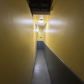 Super Chicken - Hallway to get to the bathroom, not ADA compliant - Peruvian Near Me - Falls Church, Virginia