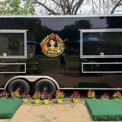 Pika Thai Bites food trailer at Nomadic Outpost in Austin serving authentic Thai street food made fresh to order.