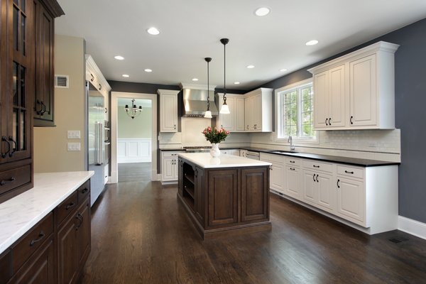Hardwood, Laminate, and Vinyl Installation - Dark - Eden Flooring has been serving the LA and Orange County area with cutting edge flooring for over ten years. Eden specializes in the installation or restoration of hardwood floors. Eden is family owned and operated, and strives to impart their family values in every aspect of our business. Whether you are planning to refinish your existing wood floors or to install new laminate, waterproof vinyl, bamboo, or exotic hardwood floors, Eden Flooring will get your job done right.
