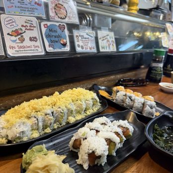 Geta - Crunch roll, salmon avocado roll, spicy avocado hamachi roll, and wakame su - Japanese Near Me - Oakland, California
