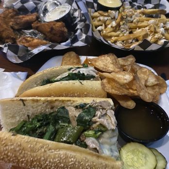 Dooney's Pub - Voorhees - Rub Roast Pork Sandwich crabby ray appetizer dry rub wings - Sports Bars Near Me - Voorhees Township, New Jersey Dooney's Pub - Voorhees - Rub Roast Pork Sandwich crabby ray appetizer dry rub wings - Sports Bars Near Me - Voorhees Township, New Jersey