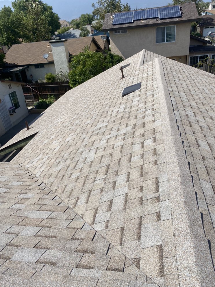 Slide of Goliath Roofing