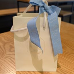 Swarovski - Fancy bag with a ribbon - Jewelry Near Me - Markham, Ontario