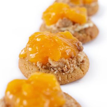 Junior Cookies - a close up of a cookie with oranges on top - Desserts Near Me - West Hollywood, California Junior Cookies - a close up of a cookie with oranges on top - Desserts Near Me - West Hollywood, California