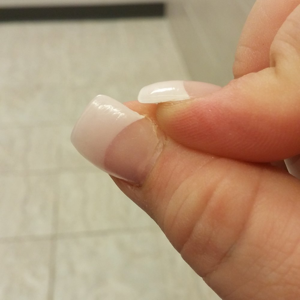 One of the nails that was coming up 3days after getting them done. One of the nails that was coming up 3days after getting them done.